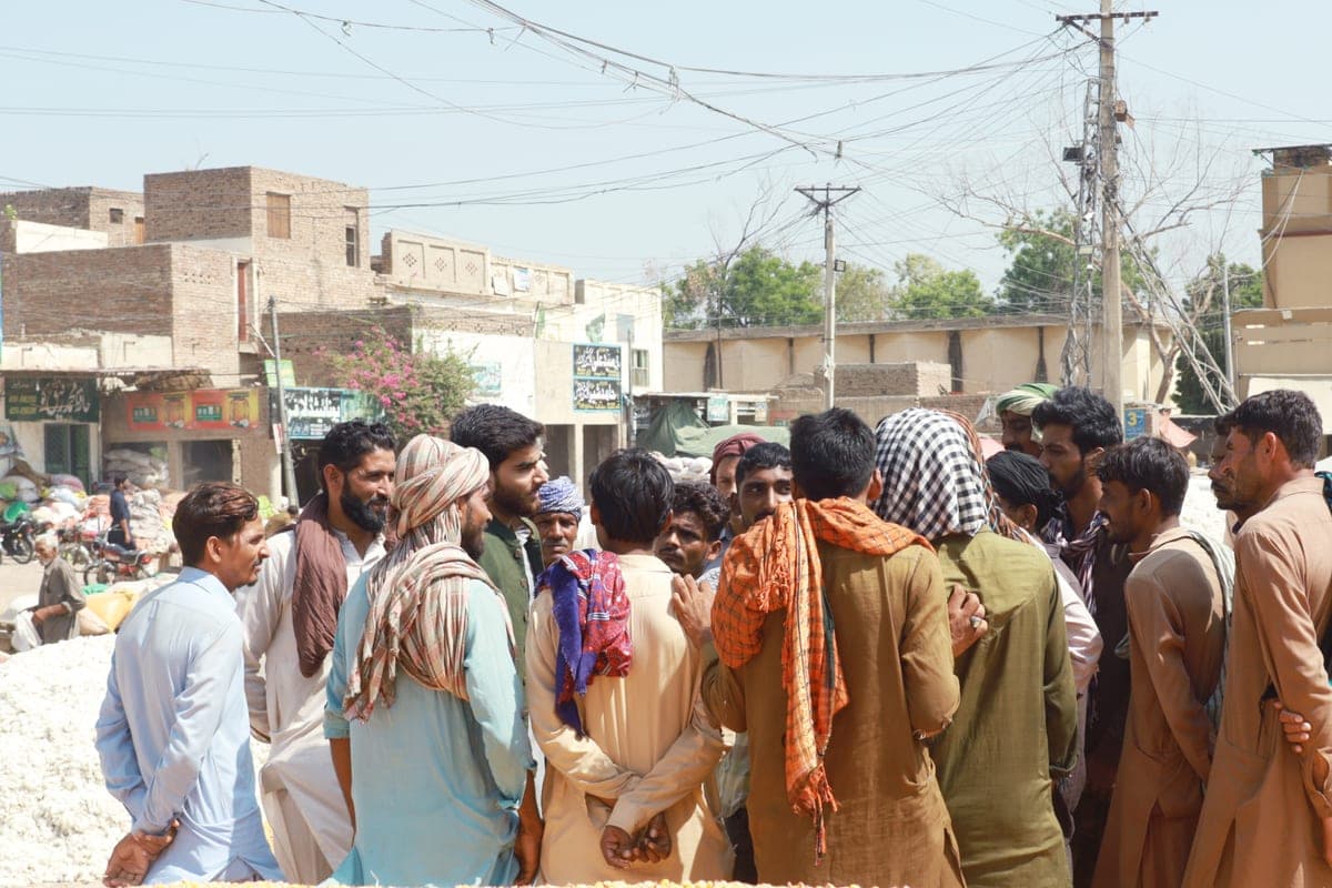 A crowd of traders gathered at a market